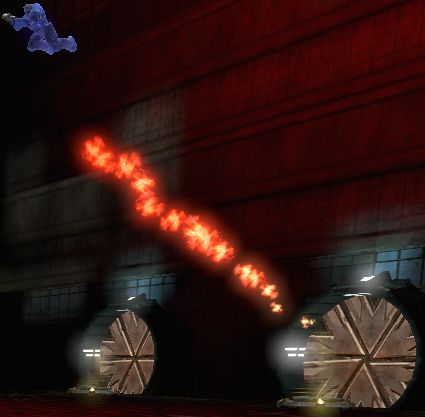 A blue bot is being excreted into the red spawn chamber